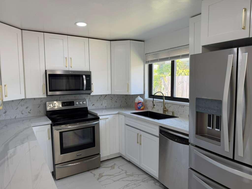 Photo of 160 SE 15th Avenue, Pompano Beach, FL 33060 (MLS # B26043730)