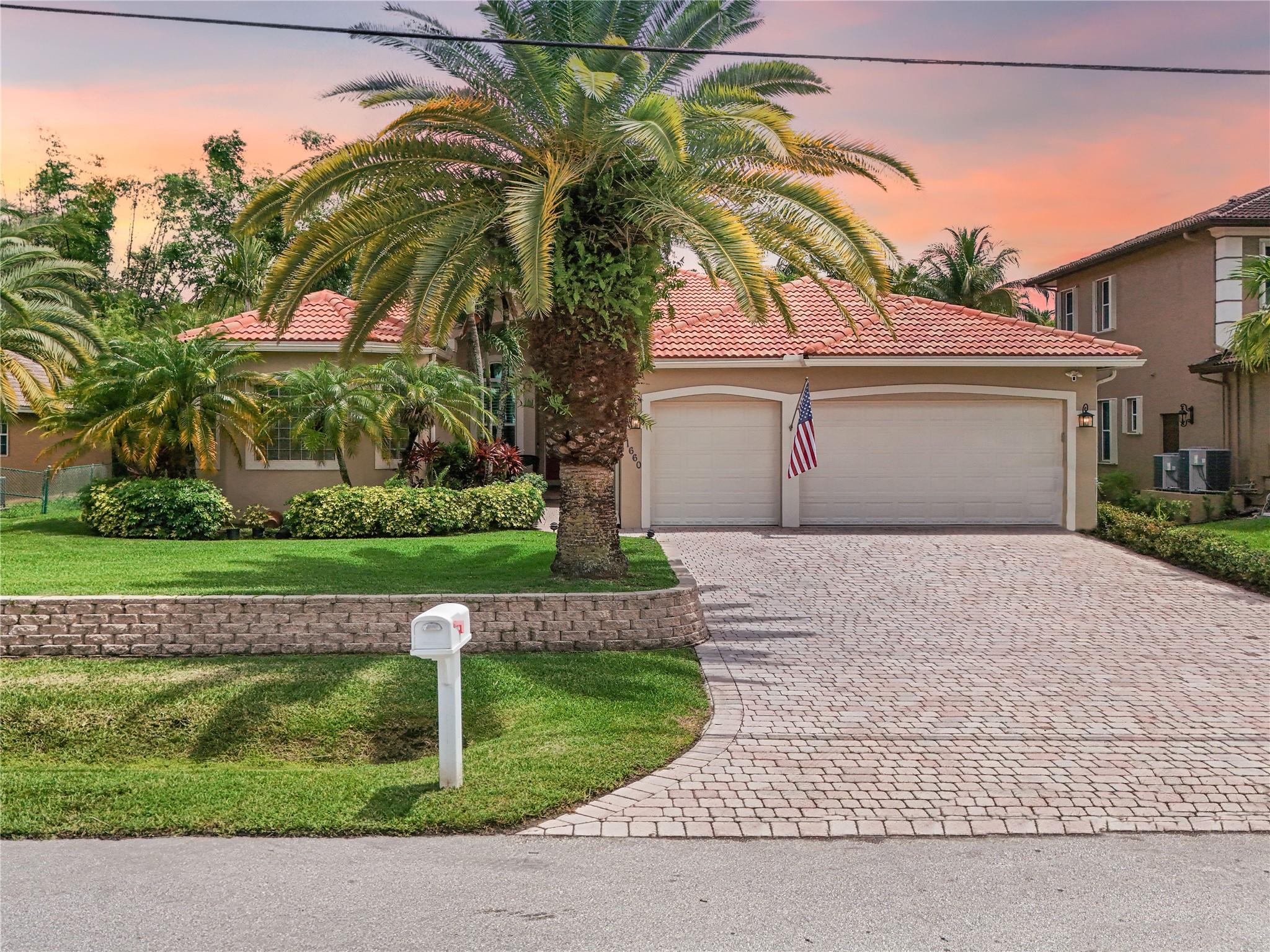 ABSOLUTELY AMAZING 5 Bed / 3 Bath home in the PRESTIGIOUS NEIGHBORHOOD OF PLANTATION ACRES boasting OVER 3,400 TOTAL SQFT, IMPACT WINDOWS & DOORS installed 2023, a lush + serene SCREENED POOL + JACUZZI area with tons of privacy, 3-car garage, GORGEOUS REAL HARD WOOD BAMBOO FLOORS + HUGE MASTER SUITE w/ double walk-in closets, an OVERSIZED DOUBLE SHOWER w/ 2 shower heads + large tub. You will love this GORMET CHEFS KITCHEN with all wood cabinetry, DOUBLE OVEN, quick boil stove, wine refrigerator, GRANITE COUNTER TOPS, moveable island + NEWER STAINLESS STEEL APPLIANCES. Laundry Room inside. Each bedroom comes ready w/ custom closet fittings. Close to all shopping and schools, 2 parks, plus Greenway. GREAT SCHOOLS nearby!
