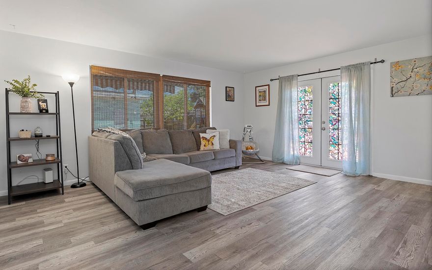 After purchasing this home in late 2022 and completing numerous upgrades, the sellers are ready for their next chapter — more space for their growing family!  This creates an incredible opportunity for buyers to step into a truly move-in-ready home. Whether you're a first-time buyer or a savvy investor, this property offers exceptional value with major improvements already in place. Plus, several first-time homebuyer programs may allow you to purchase with minimal out-of-pocket costs. Inside, you'll find thoughtfully curated updates throughout, including impact windows for peace of mind, a new front door, updated flooring, and fresh interior and exterior paint that give the home a clean, modern aesthetic.  The big-ticket items have already been taken care of, featuring a new roof, new attic insulation, a new A/C unit and air handler, a tankless water heater, and a state-of-the-art front-loading washer and dryer — all designed to provide long-term value and minimize maintenance concerns. A standout feature is the solar panel system, keeping electric costs remarkably low at approximately $40 per month (grid connection fee only). In today's market, that level of efficiency is a major advantage. Step outside to enjoy a fully fenced backyard offering privacy and security — ideal for pets, children, entertaining, or simply relaxing. The newly installed deck awning provides the perfect shaded retreat to enjoy Florida's outdoor lifestyle year-round. One of the most unique features of this home is the approximately 378 sq. ft. garage conversion, currently configured as a fully functional efficiency complete with its own bathroom and kitchenette. This versatile space is perfect for an in-law suite, accommodating extended family, providing independence for a young adult, or generating rental income (annual rental or Airbnb). With no HOA and dedicated space to store a boat or RV — tucked away yet easily accessible — this property offers flexibility that's hard to find. Whether you're looking for your first home, a multi-generational setup, or an income-producing opportunity, this home truly checks all the boxes. Don't miss your chance to own a well-updated, energy-efficient property with flexibility, value, and room to grow.