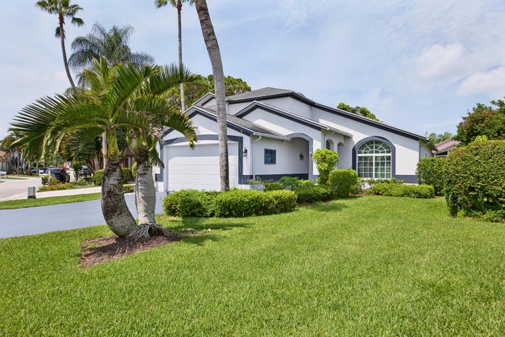 Photo 1 of 53 — 126 HAMMOCKS Drive, Greenacres, FL 33413