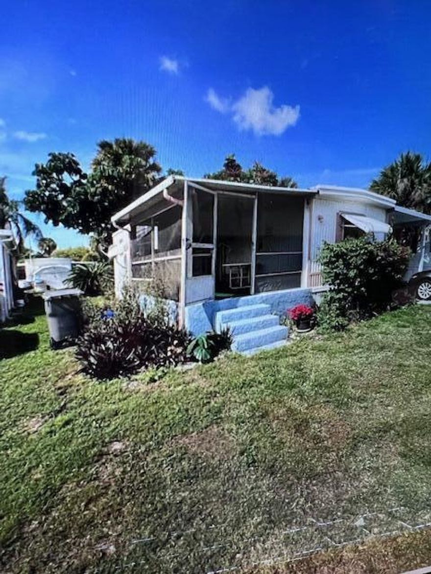 Call owner for questions.  This property is a cozy and charming manufactured home, perfect for enjoying the outdoors while staying shaded.  The home is situated on a lot with grassy front yard and beautifully landscaped, including vibrant plants and flowers.  The property also offers a driveway with ample parking space and is located in a peaceful, well-kept neighborhood.  Ideal for those looking for an affordable and comfortable living space in a warm climate.