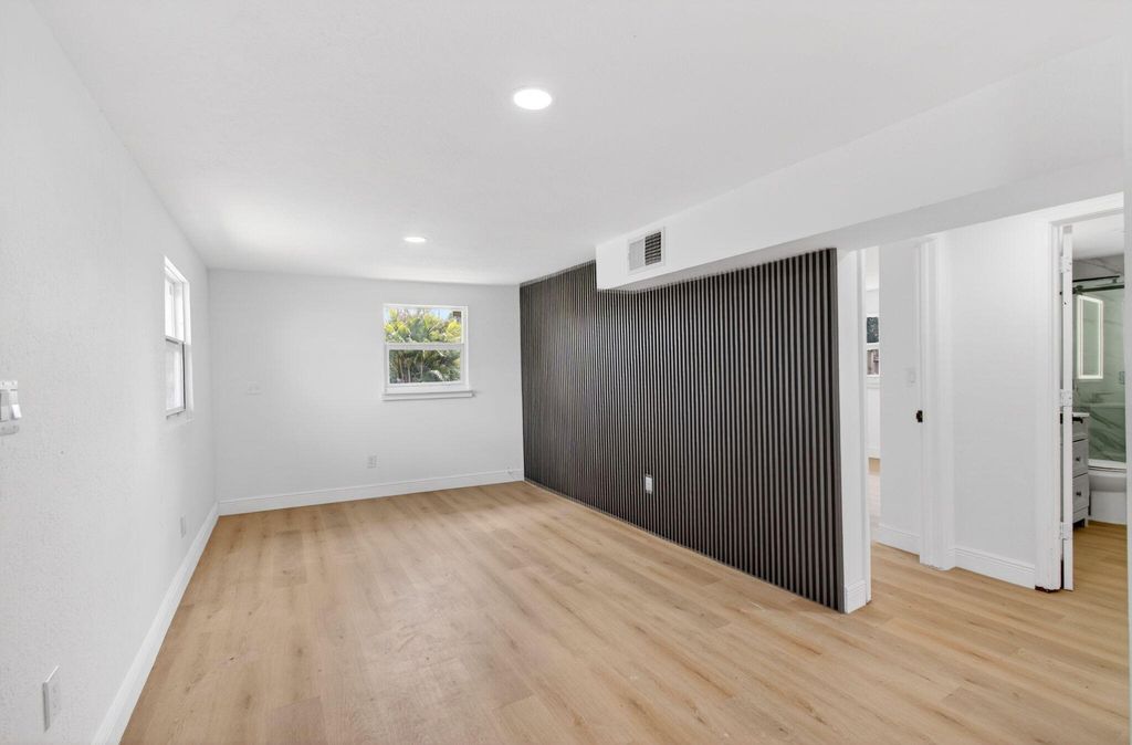 Photo of 1537 E Breezy Lane, West Palm Beach, FL 33417 (MLS # B26019154)