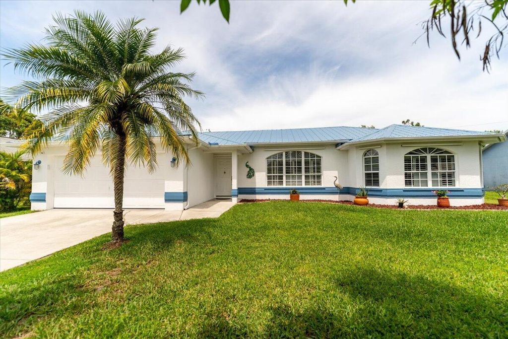 Photo of 6461 NW Friendly Circle, Port St Lucie, FL 34983 (MLS # R10893534)