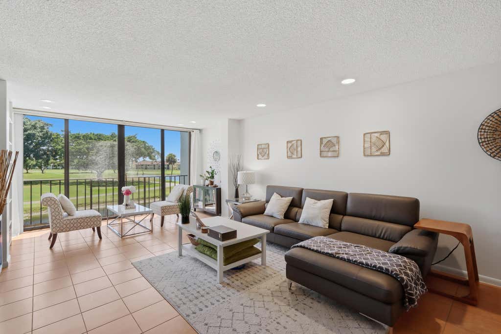 Photo of 4489 LUXEMBURG Court #202, Lake Worth, FL 33467 (MLS # B26067205)