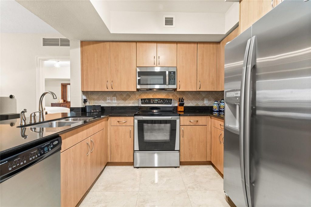 Photo of 1830 Radius Drive #303, Hollywood, FL 33020 (MLS # B26018001)