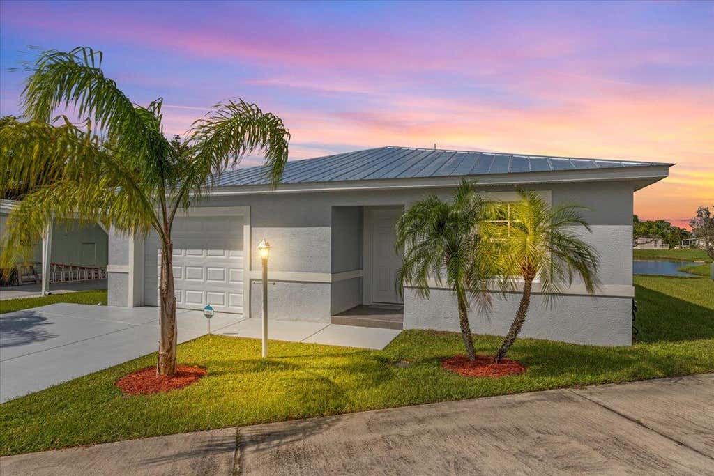 Photo of 10 Juan Carlos Lane, Port Saint Lucie, FL 34952 (MLS # R11164913)