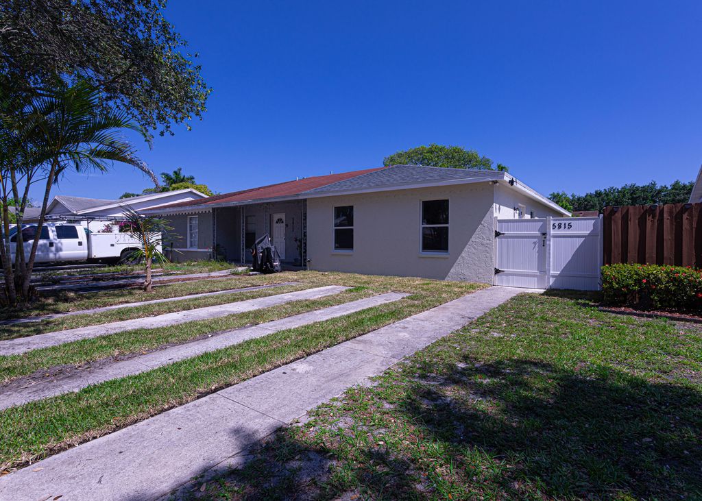 Photo of 5815 S 38th Street, Greenacres, FL 33463 (MLS # B26023397)