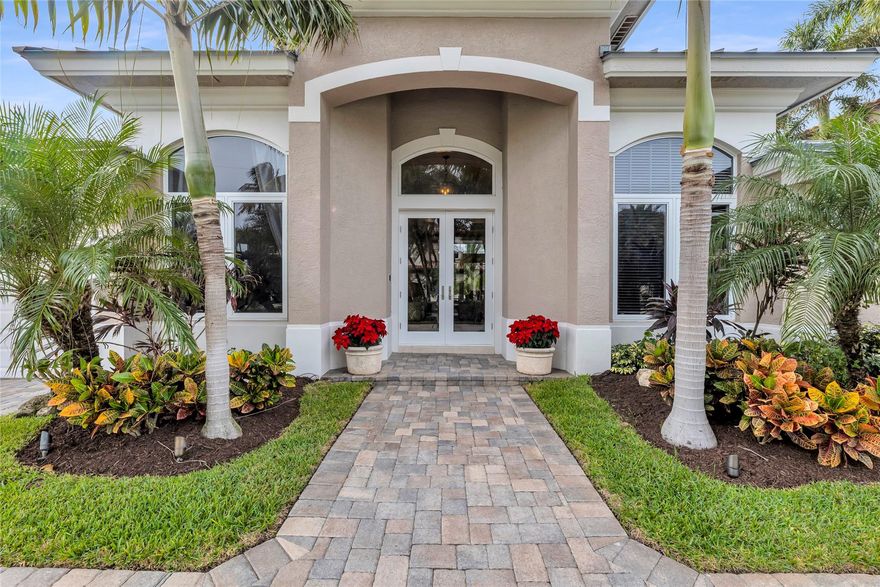 WELCOME to your TROPICAL OASIS in the HEART of VENETIAN ISLES! Located on a short Cul-de-Sac street, this 1999 CUSTOM BUILT HOME features POOL, SPA, TIKI HUT and 90 FEET of DEEPWATER with a beautifully landscaped yard and expansive patio for entertaining! VOLUME CEILINGS throughout, 4 bedrooms / 3 full bathrooms and TRIPLE SPLIT FLOOR PLAN ensuring  the ultimate in privacy, with "BONUS" den/office/playroom. OPEN CONCEPT kitchen with newer STAINLESS STEEL appliances and INDOOR laundry room. NEW Roof and AC's 2022. New IMPACT WINDOWS and DOORS in 2020. Remodeled POOL in 2018 with NEW AUTOMATED HEATING SYSTEM installed in 2022. 15,000 +/- LB. BOAT LIFT and extra wide composite dock complete this FABULOUS FAMILY HOME.