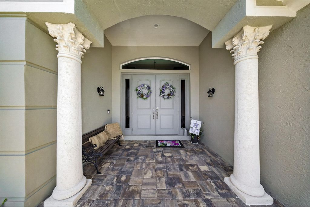 Photo of 523 SW Squire Johns Lane, Palm City, FL 34990 (MLS # B26008554)