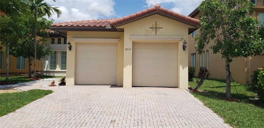 Beautiful lakefront home in the prestigious community of Heron Bay, located in the Sable Point Community.  This wonderful 3/2 is very spacious with a 2-car garage, tiled throughout the living areas, and a wonderful kitchen with lots of storage, wood cabinets, and stainless steel appliances. The floor plan has a very comfortable split bedroom design and the Primary bedroom bath, which has a separate Tub and Shower, and the convenience of dual sinks. Inside accommodations have their own laundry room as well. Very spacious back yard with a large porch overlooking the lake, making the views very pleasant and tranquil home to live in.