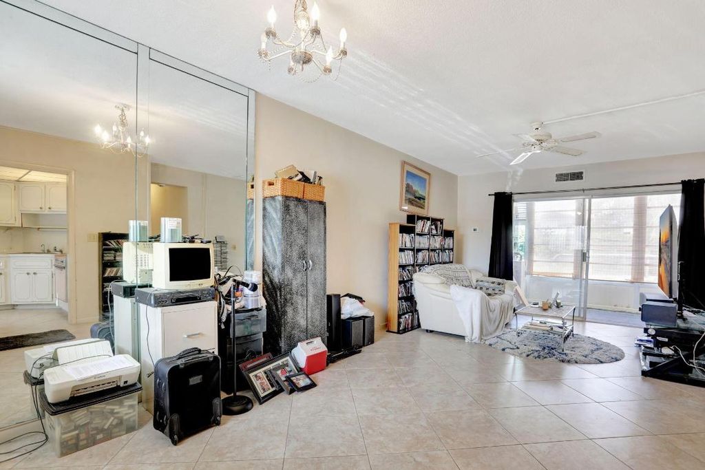 Photo of 1021 Crystal Lake Drive #109, Deerfield Beach, FL 33064 (MLS # R11096849)