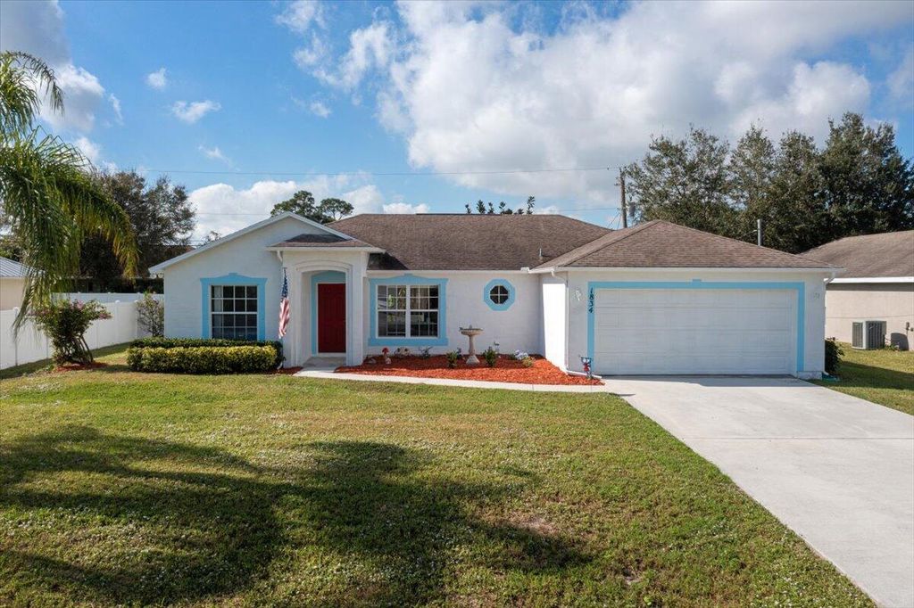 Photo of 1834 SW Davis Street, Port Saint Lucie, FL 34953 (MLS # R11048332)