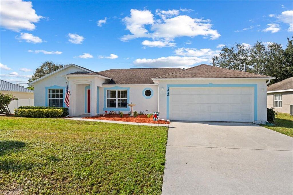 Photo of 1834 SW Davis Street, Port Saint Lucie, FL 34953 (MLS # R11048332)