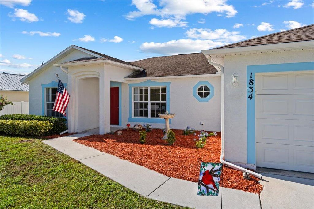 Photo of 1834 SW Davis Street, Port Saint Lucie, FL 34953 (MLS # R11048332)