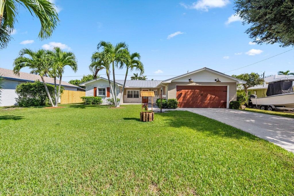 Photo of 8153 SE Carlton Street, Hobe Sound, FL 33455 (MLS # R11146534)