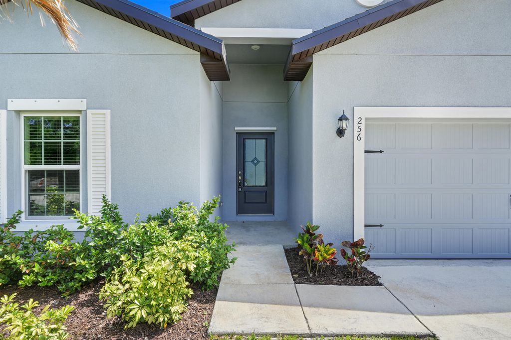 Photo of 256 SW Grove Avenue, Port Saint Lucie, FL 34983 (MLS # B26021238)