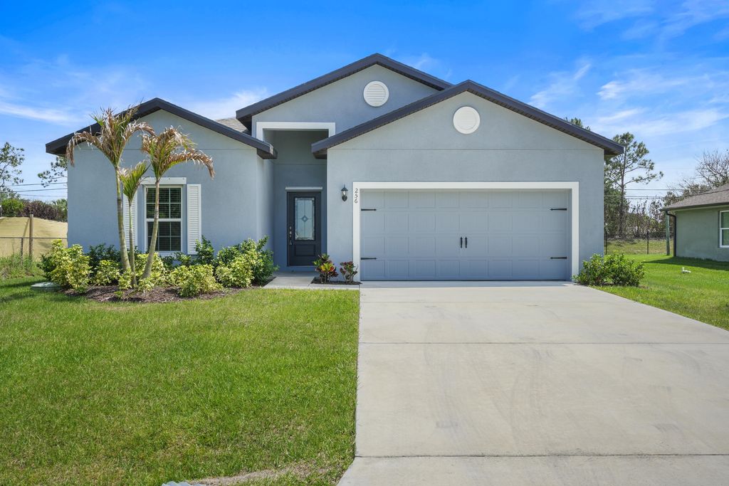 Photo of 256 SW Grove Avenue, Port Saint Lucie, FL 34983 (MLS # B26021238)
