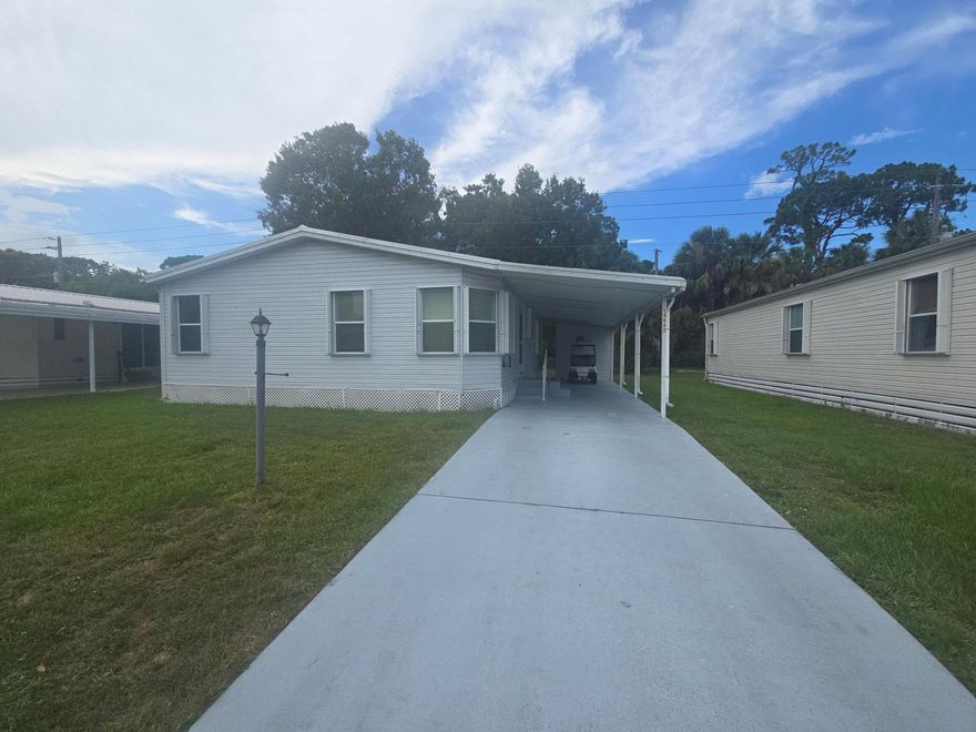 Private 2 Bed, 2 Bath Retreat on Perimeter Lot - Updated & Move-In Ready!Discover peace and privacy in this charming 2 bedroom, 2 bath home perfectly situated on a desirable perimeter lot--no rear neighbors, just serene woods and lush vegetation to enjoy from your spacious rear Florida room. This home has been thoughtfully updated for comfort and reliability, featuring: Newer Metal Roof (2020), Newer AC (2024), Newer Water Heater (2023)Additional highlights include:Large covered carportInterior laundry area for convenienceDurable laminate flooring throughoutSpacious layout ideal for year-round or seasonal living, Don't miss out on this hidden gem in a peaceful setting. Schedule your private showing today!