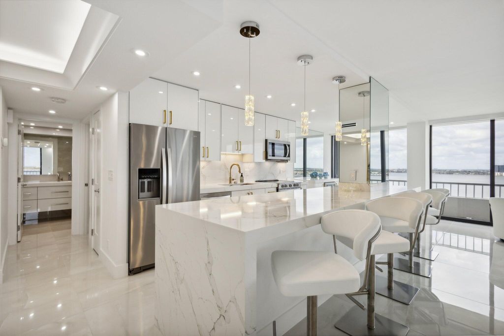 Photo of 5550 N Ocean Drive #20- D, Singer Island, FL 33404 (MLS # R10971045)