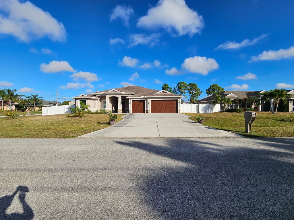 Photo of 5768 NW ZENITH Drive, Port Saint Lucie, FL 34986 (MLS # B26053797)