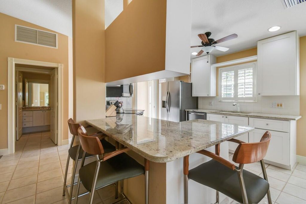 Photo of 8392 SE Paurotis Lane, Hobe Sound, FL 33455 (MLS # R11060409)