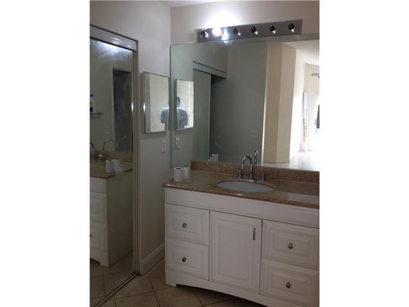 Photo of 1307 E Glen Oak Road, North Lauderdale, FL 33068 (MLS # B26087684)