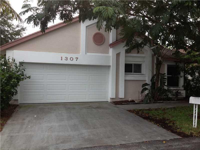 Photo of 1307 E Glen Oak Road, North Lauderdale, FL 33068 (MLS # B26087684)