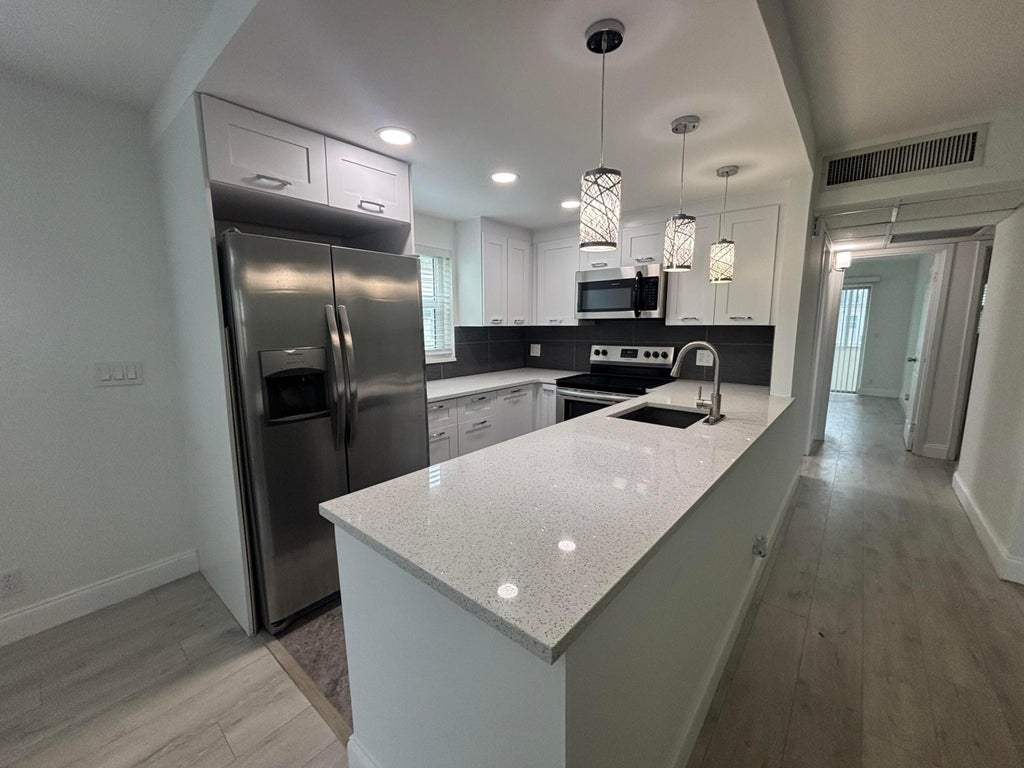 Photo of 212 Monaco E, Delray Beach, FL 33446 (MLS # B26054200)