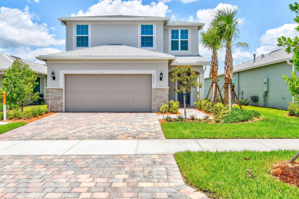 Photo of 12321 SW Sand Dollar Way, Port St Lucie, FL 34987 (MLS # R10908252)