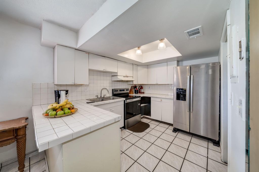 Photo of 7 Ann Lee Lane, Tamarac, FL 33319 (MLS # B26006633)