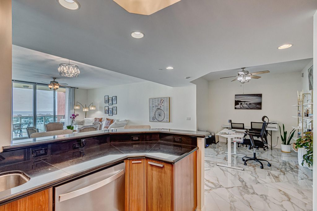 Photo of 2640 Lake Shore Drive #2014, Riviera Beach, FL 33404 (MLS # B26023254)