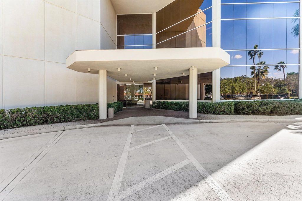 Photo of 4500 Pga Boulevard #104, Palm Beach Gardens, FL 33418 (MLS # R11140597)