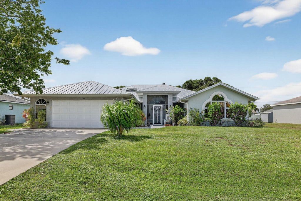 Photo of 1226 SW Avens Street, Port Saint Lucie, FL 34983 (MLS # R11124130)