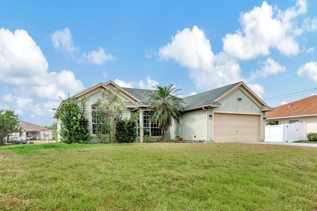 Photo of 1882 SW Inlander Avenue, Port Saint Lucie, FL 34953 (MLS # F10436953)