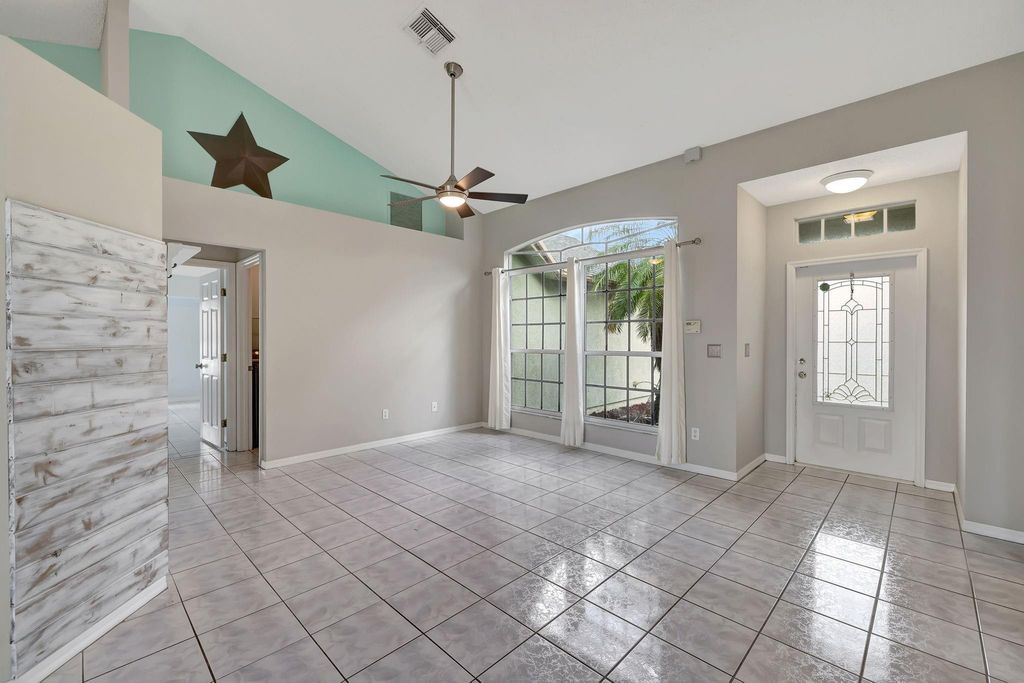 Photo of 1882 SW Inlander Avenue, Port Saint Lucie, FL 34953 (MLS # F10436953)