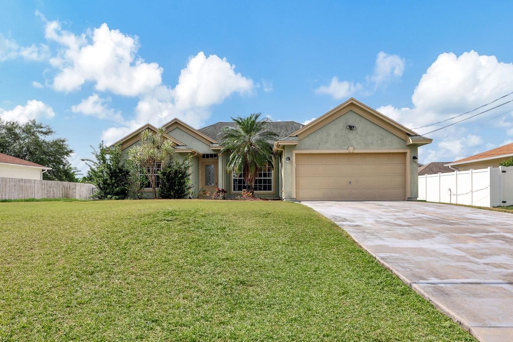 Photo of 1882 SW Inlander Ave, Port St Lucie, FL 34953 (MLS # F10436953)