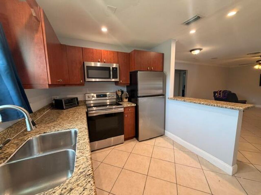Photo of 1983 Juno Road, North Palm Beach, FL 33408 (MLS # B26024891)