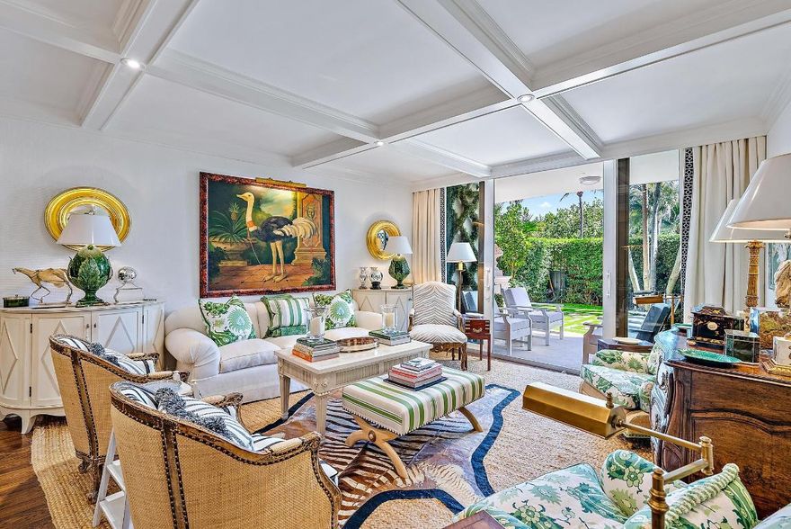 A rare 3 bedroom condo in a boutique building across from the ocean, One Royal Palm. AD designer decorated & fully renovated with a sublime private garden space with grass & patio to enjoy the cool ocean breeze. Luxury amenities include solid hardwood floors, intricate millwork, new kitchen & baths, bar area, & laundry in the residence. The primary suite is a dream with glass doors to the garden, a soaking tub, separate shower, double vanities & a spacious closet. The kitchen includes Calcutta marble, Wolf & SubZero appliances. Full-service building amenities include a door person, garage parking, storage, pool, gym, on-site building manager, full-time maintenance staff, car washing service, & an 8,000 SF common terrace. Minutes to iconic Worth Avenue, fine dining, beaches, & the airport.