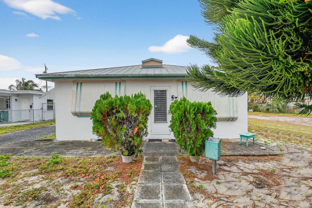 Photo of 620 58th Street, West Palm Beach, FL 33407 (MLS # B26004230)