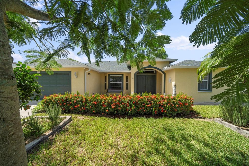 Photo of 324 NE Gladiola Avenue, Port Saint Lucie, FL 34983 (MLS # R11151427)