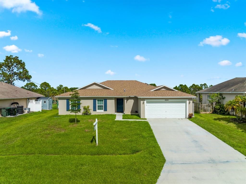 Photo of 6245 NW Gisela Street, Port Saint Lucie, FL 34986 (MLS # R10844911)