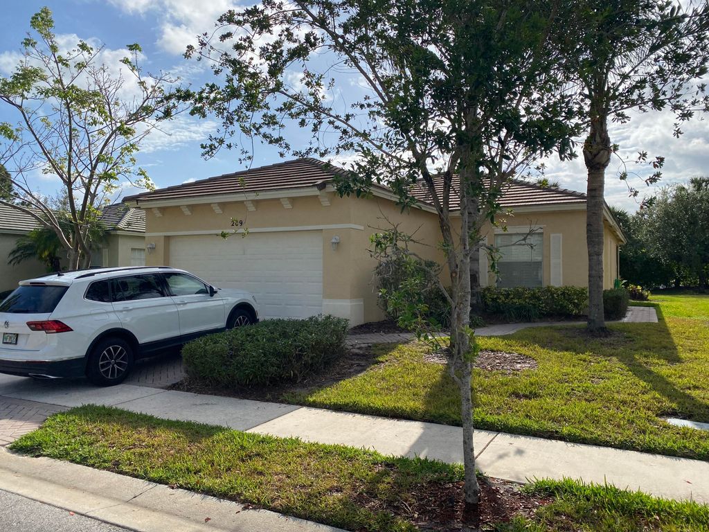 Photo of 209 SW Deleon Springs Drive Dr, Saint Lucie West, FL 34986 (MLS # R10796502)