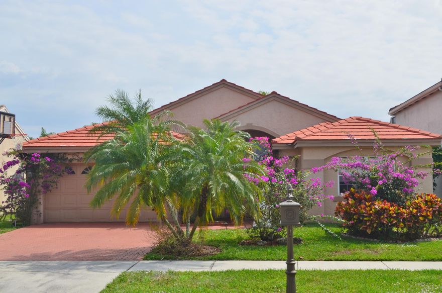 Light and open home with split bedroom plan for extra privacy. Fenced yard. Updated kitchen w/granite & stainless steel appliances. Tile and wood floors throughout. Master Suite has large walk-in closet, updated vanity w/double sinks,updated floor/shower tile,
soaking tub + separate shower. Separate Living, Dining and Family Rooms. Community pool, tennis, clubhouse & more. ''A'' rated schools,
parks and shopping are all nearby. Fantastic, pet friendly neighborhood where all ages are welcome and NO CLUB MEMBERSHIP fees.