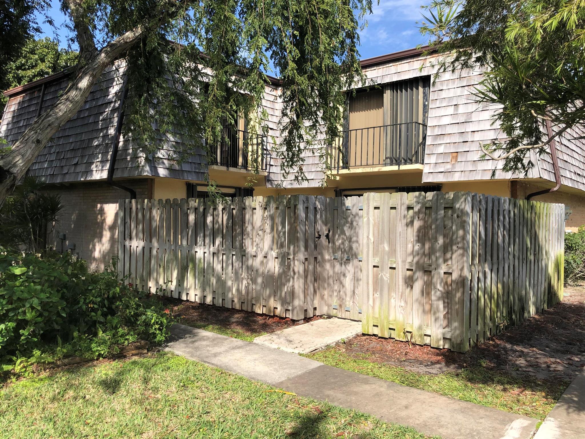 Schedule a private showing today to see this recently remodeled townhome. The open floor plan and sliding glass doors in every room gives this home a bright and spacious feeling. Full bathroom and laundry room downstairs. Bedrooms and another full bath upstairs. Huge private patio great for BBQ's and entertainment. SS appliances, granite countertops and newer cabinets in kitchen and baths. No minimum credit score requirements and NO dog breed restrictions!
