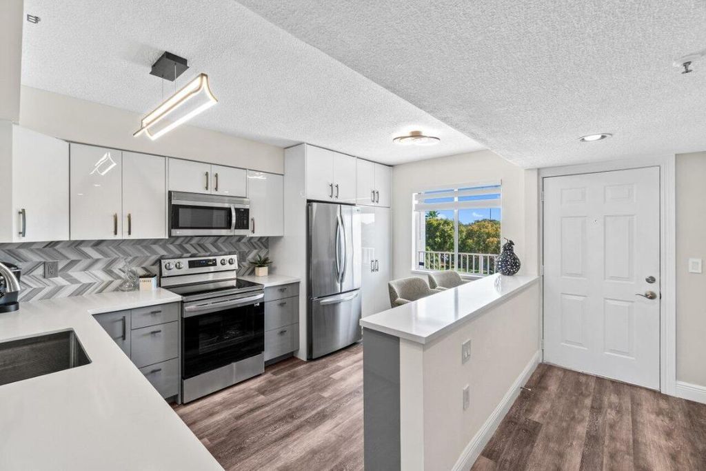 Photo of 14095 Royal Vista Drive #409, Delray Beach, FL 33484 (MLS # R11156782)