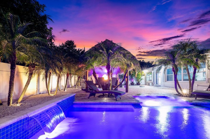 Lake Clarke Shores - 5BR / 5BA - Saltwater Pool - Income Producing - Transferable STR LicenseWelcome to this spacious and beautifully updated 5-bedroom, 5-bath pool home in the exclusive community of Lake Clarke Shores, just one block from the water. This property offers a true South Florida lifestyle with a saltwater pool, lush outdoor areas, and direct access to community amenities including a private boat ramp, dedicated local police, city tennis courts, outdoor gym, and a family-friendly park.Inside, the home features generous living spaces, upgraded finishes, and excellent natural light throughout. Perfect for large families, multi-generational living, or investors seeking strong returns.