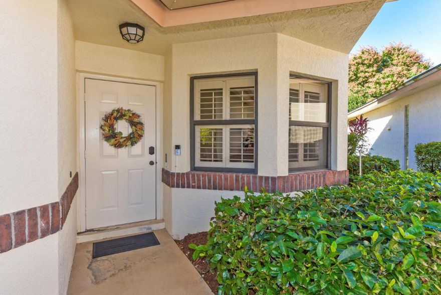 Welcome to Presidential Cove of Country Club Estates. Excellent location in St. Lucie West. This beautifully maintained 2-bedroom, 2-bath home with a 2-car garage offers an easy, low-maintenance lifestyle. Vaulted ceilings create a bright, open feel, while the enclosed screened patio is ideal for relaxing and enjoying Florida living year-round. Located behind a gated entry, the home is in exceptional, move-in-ready condition—perfect for those who want to enjoy the area rather than work on a home. Walk or ride to Country Club Estates, with convenient access to shopping, dining, and recreation. Ideal for full-time residents, seasonal owners, or a lock-and-leave retreat. A great location and a great place to call home.