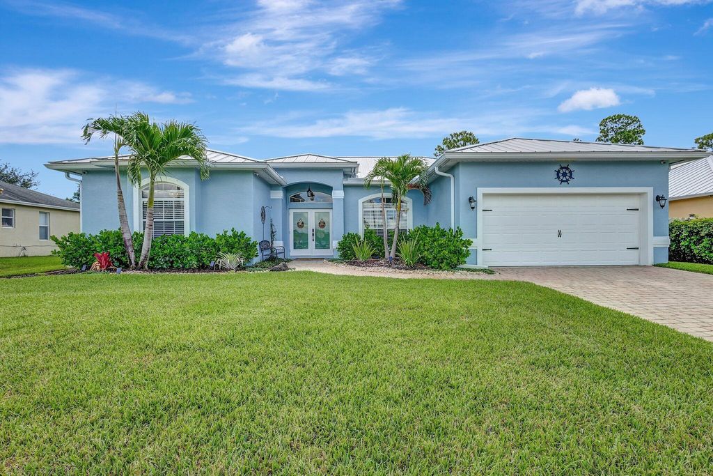 Photo of 3231 SW Mcmullen Street, Port Saint Lucie, FL 34953 (MLS # R11001023)