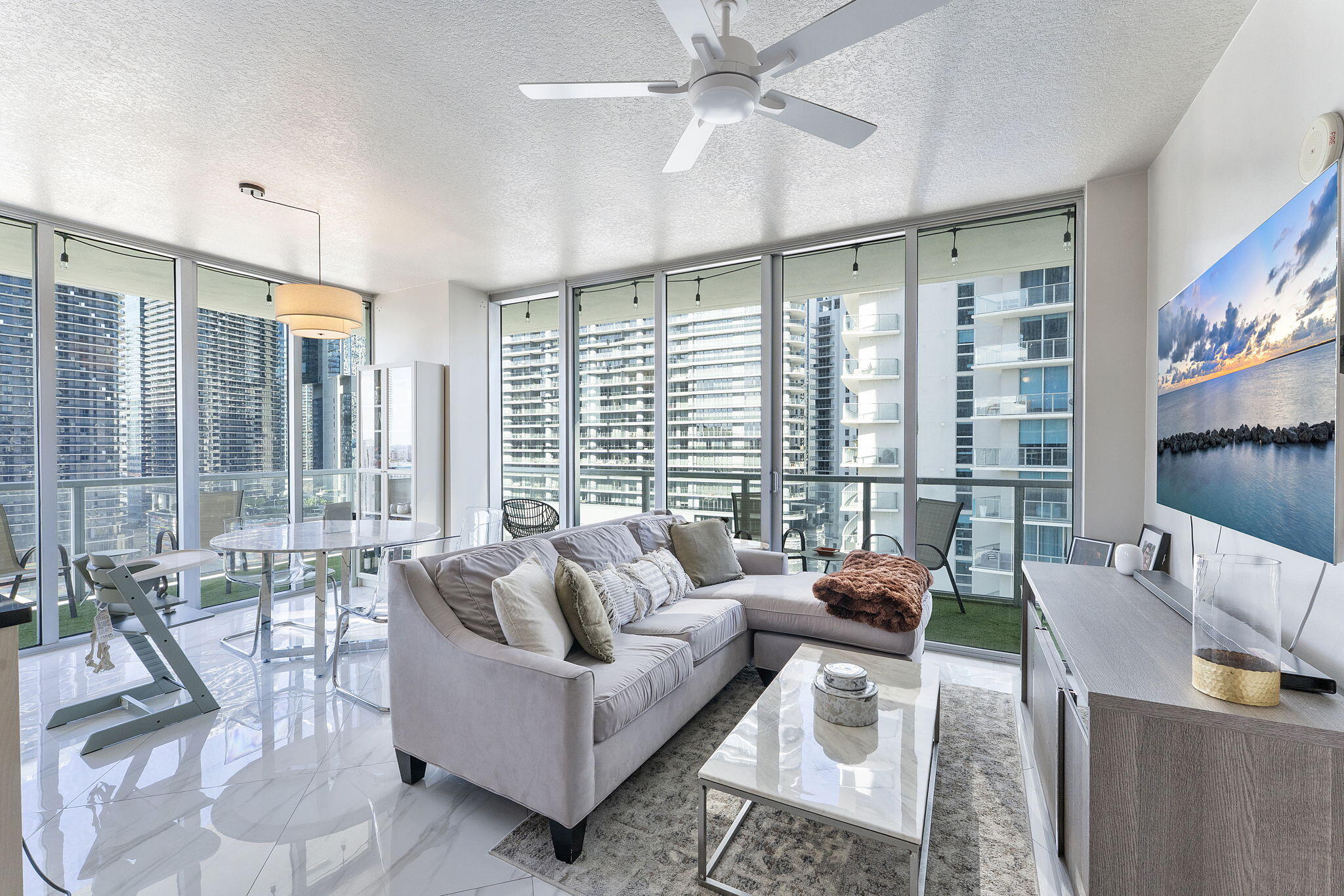 Luxury Living in the Heart of BrickellExperience Miami at its finest in this stunning 2-bdrm, 2-bth high-rise condo located on the 24th floor of the premier Brickell Avenue building, Axis.This spacious corner residence boasts a wrap-around balcony with breathtaking panoramic city views, perfect for enjoying Miami's vibrant skyline both day and night. Inside, you'll find a modern open-concept layout with floor-to-ceiling windows, an abundance of natural light, and high-end finishes throughout.Both bedrooms offer comfort and privacy, while the sleek kitchen is ideal for entertaining or a quiet night in.Step outside your door and enjoy resort-style amenities including a sparkling pool, state-of-the-art fitness center, and more. The best dining, shopping, and nightlife just steps away!