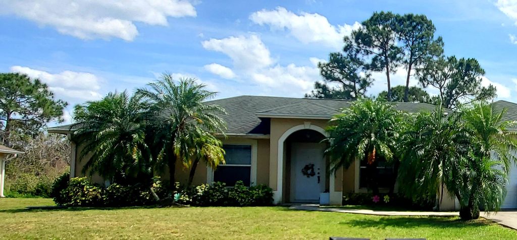 Photo of 1392 SW Glastonberry Avenue Ave, Port St Lucie, FL 34953 (MLS # R10794326)